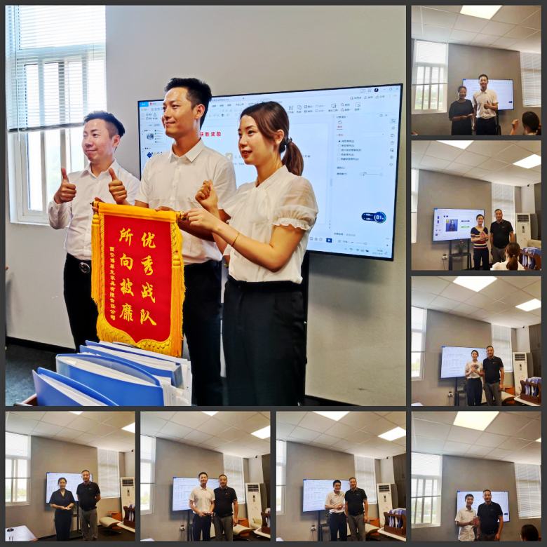 博菲克業(yè)務(wù)部獲勝戰(zhàn)隊領(lǐng)取獎杯.jpg